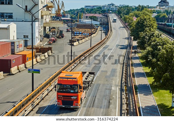 ODESSA, UKRAINE - August, 31, 2015: Maritime\
cargo port of Odessa . Container terminal . Loading is carried out\
works of Ukrainian industrial goods and cargo , April 16, 2014\
Odessa, Ukraine
