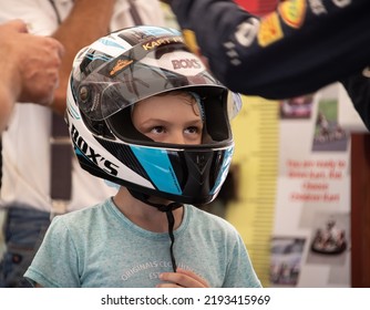 ODESSA, UKRAINE - August 7, 2022: Healthy Lifestyle. Sport Family. Family Vacation At Karting Track. Children With Parents Go In For Motorsports. Karting. Hobbies, Sports Education, Leisure, Lifestyle