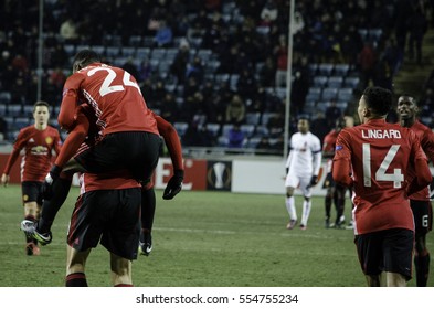 ODESSA, UKRAINE - December 08, 2016: Football Players Manchester United Together Hugging And Celebrating Goal During The UEFA Europa League Match Between Zarya Lugansk Vs Manchester United, Ukraine