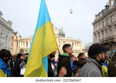 Odessa, Ukraine
February,20,2022
People wrapped in flags of Ukraine carry the flag of Ukraine on the Unity March