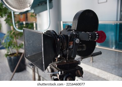 ODESSA, UKRAINE - JUL 16, 2014: 35mm Movie Camera, With Magazine, Eye Piece, Lens And Matbox, On Fluid Head, In Interior Lobby Of Odesa Film Studio.