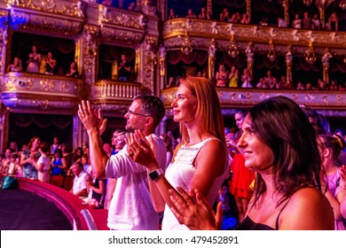 ODESSA, UKRAINE - July 16, 2016: Ukrainian singer Jamala at solo concert at Opera House. Satisfied with fans in hall. Spectators at concert during creative light, music show fashionable jazz orchestra