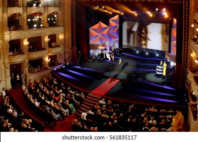 ODESSA, UKRAINE - July 21, 2012: Spectators In Audience Hall Of Viewers Of Odessa State Opera And Ballet Theatre During Opening Of International Film Festival. Audience At Concert At Theater