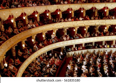 ODESSA, UKRAINE - July 21, 2012: Spectators In Audience Hall Of Viewers Of Odessa State Opera And Ballet Theatre During Opening Of International Film Festival. Audience At Concert At Theater