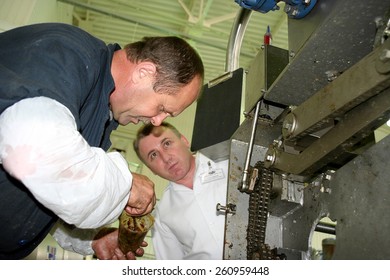 Odessa, Ukraine - July 7, 2007: The Factory For The Production Of Food From Natural Ingredients. Food Convenience Food. Production Of Dumplings, Pancakes. Repair Of Old Equipment