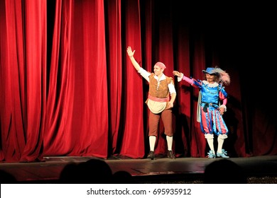 Odessa, Ukraine -  June 06, 2013: Artists Bow To Audience On Stage Against The Backdrop Backstage After Performance. 