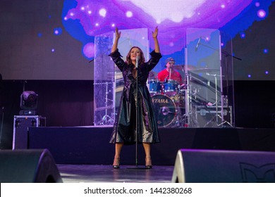 Odessa, Ukraine June 30, 2019: Concert Of Ukrainian Singer NATALIA MOGILEVSKA On Large Open-air Concert Venue. Artist Performs Songs From Stage At Nightclub. Artist On Club Stage During Night Party.