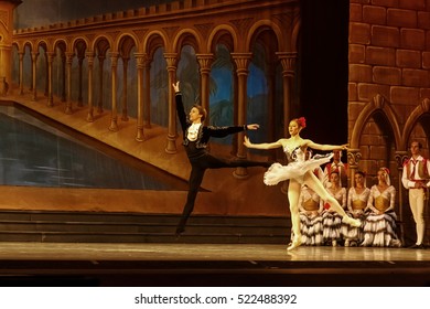 ODESSA, UKRAINE - June 6, 2013: The actors on stage of ballet Don Quixote on stage of Odessa National Opera and Ballet Theatre. Dancers and dancers in colorful costumes during show, moving motion