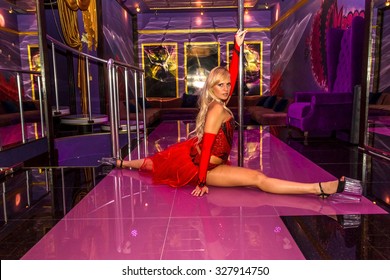 ODESSA, UKRAINE - June 6, 2015: Striptease bar. Young sexy girl in strip club luring visitors to the lap dance. Men with a striptease clubs are gaining popularity in a period of crisis in the country