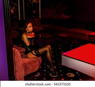 ODESSA, UKRAINE - June 6, 2015: Striptease bar. Young sexy girl in strip club luring visitors to the lap dance.   striptease clubs are gaining popularity in a period of crisis in the country