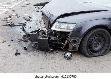 ODESSA, UKRAINE - MARCH 27, 2017: Car accident in city center. Broken car, the engine oil leaked, wheel burst. - Shutterstock ID 610130783