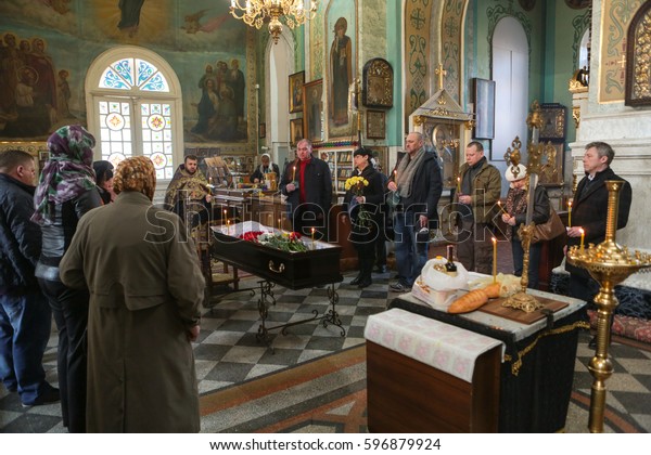 Odessa, Ukraine March 9, 2017:\
Slavonic funeral with burial of deceased in temple and burial in\
cemetery. Funeral service. Funerals in Orthodox\
traditions.