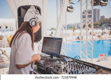 Odessa, Ukraine May 1, 2016: Ibiza Pool Beach Club. Dj Playing Good Music At Summer Pool Party. Day Lounge Party At Luxury Summer Club. Ibiza Dj At Work