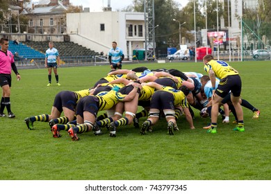 ODESSA, UKRAINE - May 21, 2017: European Rugby Champions Cup UKRAINE (blue) And Sweden (yellow). Rugby Ball On Field. Rugby Match Is A Heavy Fight For Ball. Rugby Players On Field