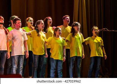 Odessa, Ukraine - May 25, 2016: Children's musical groups singing and dancing on stage. Children's performance. Emotional children's show on stage. Children's Ballet. Dancing on stage.