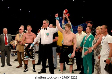 ODESSA, UKRAINE - MAY 31, 2014: World Champion Alexander SPYRKO - Ukraine in the boxing ring after winning the title fight over Gyula VAJDA - Hungary K2 version, May 31, 2014 in Odessa, Ukraine.
