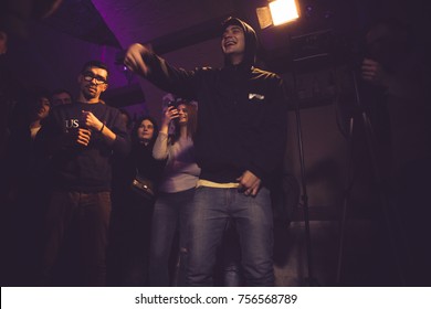 Odessa, Ukraine October 14, 2017: Craft Party Bar. Rap Battle At Underground Club. Man Participate In The Rep Battle With Large Number Of Spectators.