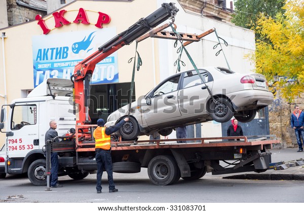 ODESSA,\
UKRAINE - OCTOBER 24, 2015: car hauler picks up after a car\
accident October 24, 2015 in Odessa,\
Ukraine