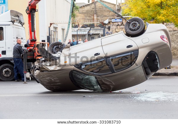 ODESSA,\
UKRAINE - OCTOBER 24, 2015: car hauler picks up after a car\
accident October 24, 2015 in Odessa,\
Ukraine