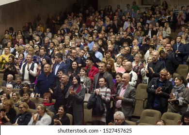 ODESSA, UKRAINE - October 9, 2019: Spectators In The Theater. Spectators Standing Ovation Favorite Artists At The Premiere Of The Play.