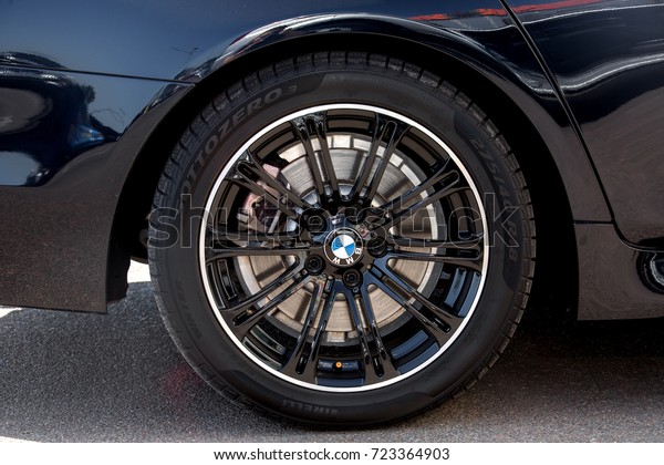 Odessa, Ukraine - September 17, 2017: Wheel\
cast disk of the black  BMW, rim close\
up.