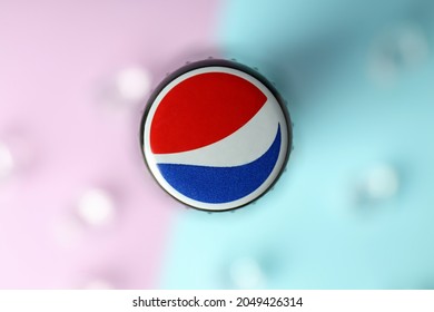 Odessa, Ukraine - September 23, 2021: Pepsi bottle on two tone background, top view and macro.