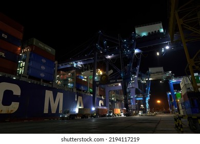 Odessa, Ukraine SIRCA 2019: Container Ship At Port Terminal. Containers Loading By Crane In Night , Trade Port. Container Operation In Port Series