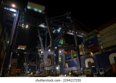 Odessa, Ukraine SIRCA 2019: Container Ship At Port Terminal. Containers Loading By Crane In Night , Trade Port. Container Operation In Port Series