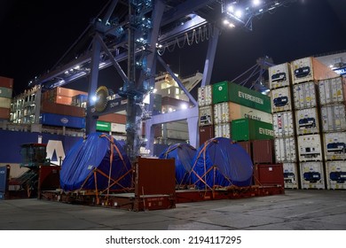 Odessa, Ukraine SIRCA 2019: Industrial Object On Flat Rack Container Box At Port Terminal In Night Time Waiting For Shipping At Harbour