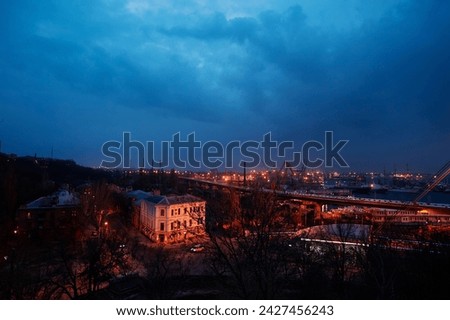 Odessa, Ukraine – view of the Odessa port from Mother-in-law Bridge, sunset overlooking the Odessa Bay, industrial landscape