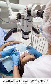 Odessa,Europe, Ukraine May, 20, 2020. Dental Treatment Under The Microscope, Women Dentist Treats Teeth Using A Microscope Dental Clinic 