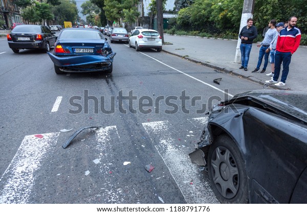 ODESSA,UKRAINE -09,24 2018: broken cars as result\
of traffic accident on pedestrian crossing. Accident. Road accident\
on marking of pedestrian crossing, car crash, collision, insurance\
case on highway