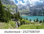 Oeschinensee Lake hike in Switzerland, near Kandersteg in the Swiss Alps