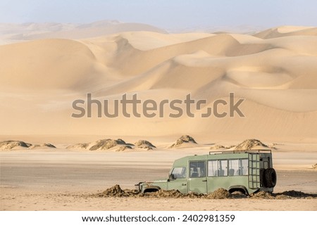 off road car stuck in the sand of Namib desert, Namibia, Africa