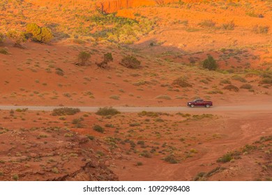 Off- Road On A Duty Road Through The Monument Valley. Tour To The Landmarks Of The Wild West USA. Navajo Tribal Park.