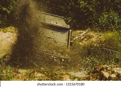 Off road sport truck between mountains landscape. Drag racing car burns rubber. Extreme. Off-road car. Track on mud. 4x4 Off-road suv car. Offroad car. Safari - Shutterstock ID 1315670180