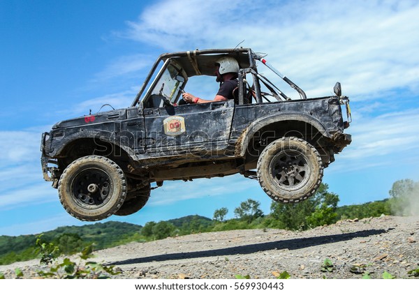 Off road vehicle on the\
4X4 rally race \