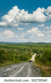 Off Road Vehicles On A Logging Road Through The North Maine Woods