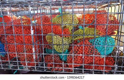 Off Season Colorful Lobster Bait Bags Stored In Metal Lobster Traps 