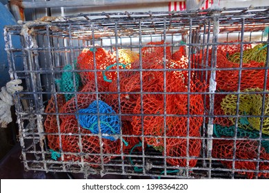 Off Season Colorful Lobster Bait Bags Stored In Metal Lobster Traps 