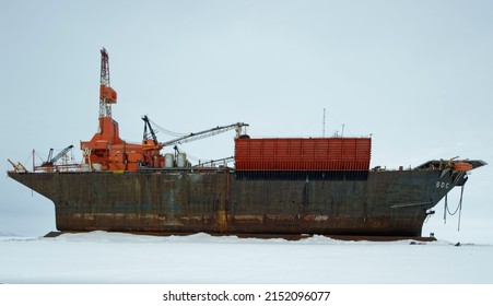 Off shore oil drilling ship on steel platform frozen in Canadian Beaufort Sea ice near Herschel Island, Yukon Canada in wint