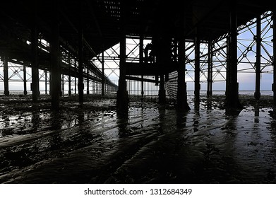 Off Verulam Place A259, Hastings, East Sussex, England. January 20th 2011.
 
Low Tide At Sunrise In Winter Beneath The Pier At Hastings (after The Fire Of 2010)