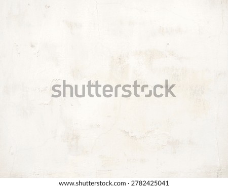 Off white aged plaster wall texture with fine cracks, faint stains, and weathered surface marks.