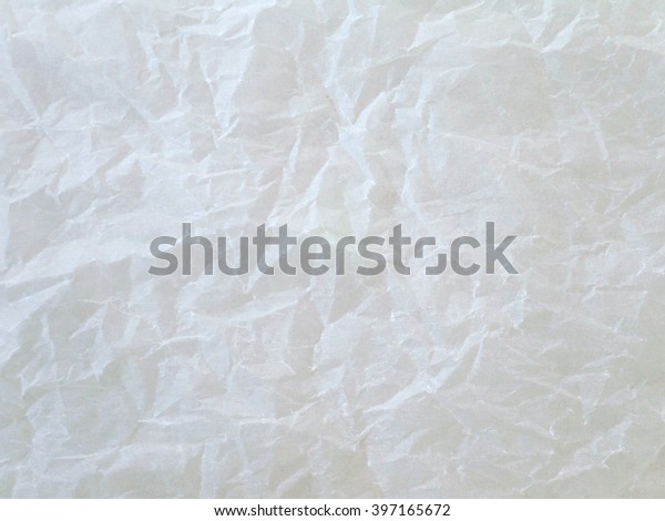 Off white\
crumpled wax paper sheet\
background
