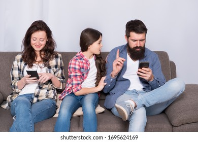 Offended feelings. Stop ignoring kid. Stuck in online. Ignored child. Busy parents surfing internet smartphones. Dad and mom ignoring daughter needs. Bad habits. Parenthood failure. Ignored baby.