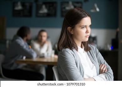 Offended Frustrated Millennial Woman Feeling Upset Suffering From Loneliness Having No Friends Or Boyfriend Sitting Alone In Cafe, Sad Social Outcast Or Loner Girl Thinking Of Problem In Public Place