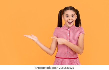 offer and suggest. product proposal. surprised kid pointing finger on copy space. - Shutterstock ID 2151833525