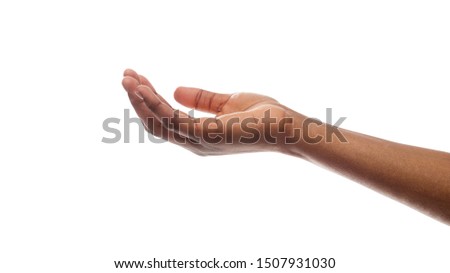 Offering or begging concept. Closeup of black female hand keeping empty cupped palm isolated on white background.