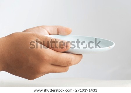 Offering Gesture with Plain Dish