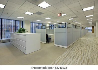 Office area with cubicles in high rise building